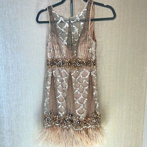 Sue Wong champagne/rose gold cocktail sheath with feathers and sequins. …